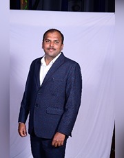 Dr. Purushotham KN